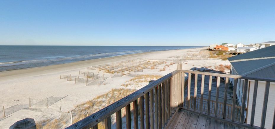 View of the beach from a porch at Cape San Blas